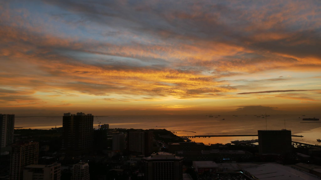 Manila Philippines sunset, four week island hopping itinerary Philippines