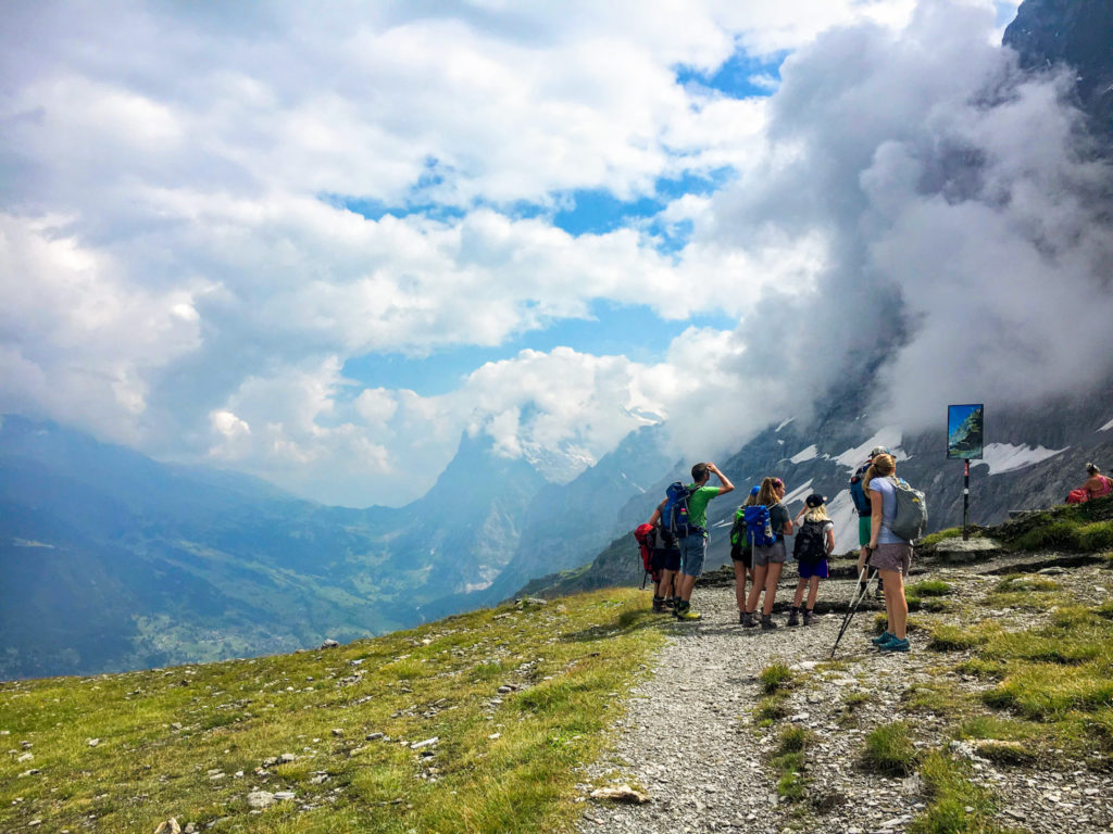 Hiking the Eiger trail in Switzerland, in the Swiss Alps. Between Kleine Scheidegg, Grindelwald, Lauterbrunnen, and Interlaken hike