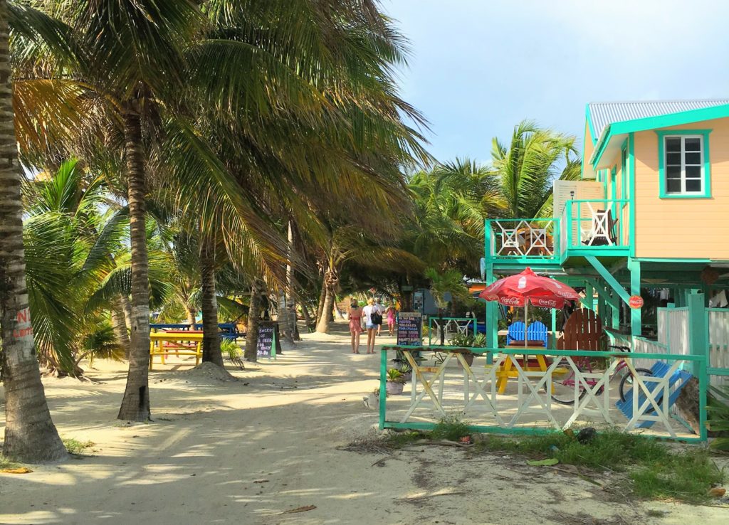 Caye Caulker Belize an island getaway. Less than three hours from America is Belize and Caye Caulker Island. Read where to stay, where to eat, what to do on Caye Caulker, Belize