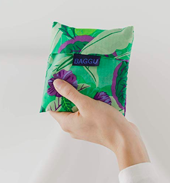 Sustainable travel packing list, what to pack to travel sustainably and lower your carbon footprint. Reusable bag, shampoo bars, earth-friendly products, reduce plastic use
