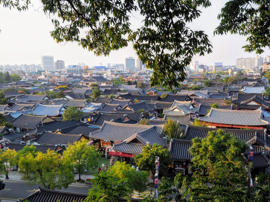 Jeonju South Korea Jeonju Hanok Village Things to do in Jeonju why everyone should visit Jeonju Korea. Eat Bibimbap, wander the Hanok Village, go to the viewpoint, free museums, mural village, confucian school, rent a hanbok