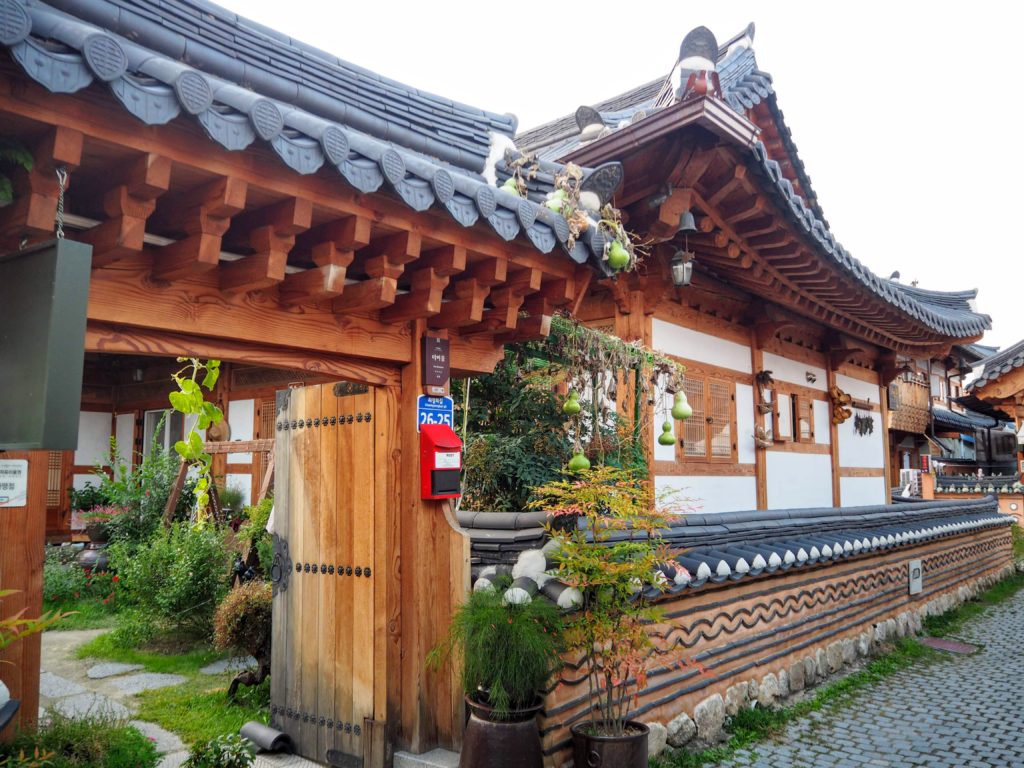 Jeonju South Korea Jeonju Hanok Village Things to do in Jeonju why everyone should visit Jeonju Korea. Eat Bibimbap, wander the Hanok Village, go to the viewpoint, free museums, mural village, confucian school, rent a hanbok