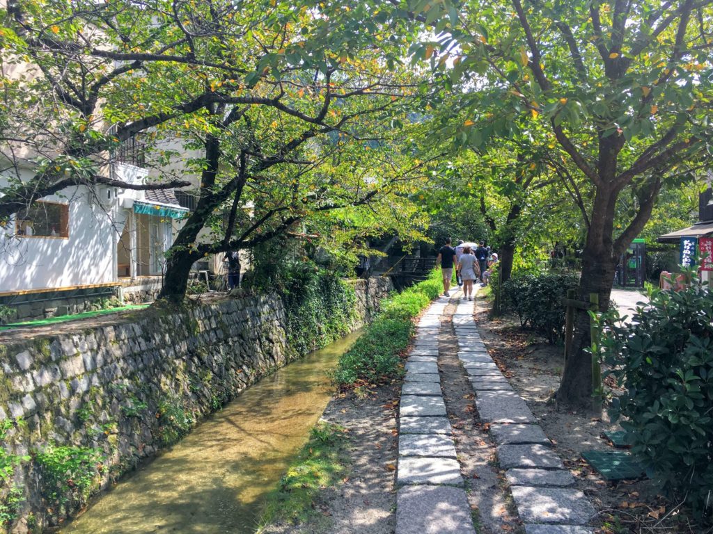 kamogawa river Kyoto three day itinerary, the perfect three days in Kyoto itinerary, things to do in Kyoto, Kiyomizudera, Ginkakuji, Kinkakuji, Arashiyama, Gion in three days in Kyoto nishiki market philosopher's path