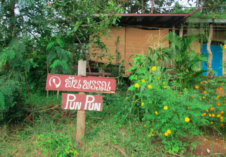 Pun Pun organic farm in Chiang Mai Thailand sign post