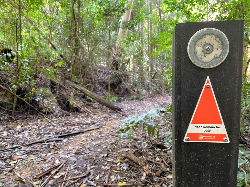 Hiking the Piper Comanche Wreck Trail in 2022, Piper Comanche bushwalk from Brisbane, Piper Comanche Wreck hiking D'Aguilar National Park, hikes near Brisbane, Piper Comanche wreck Brisbane bushwalking, what to expect on the Piper Comanche trail, Piper Comanche Wreck trail marker, leeches