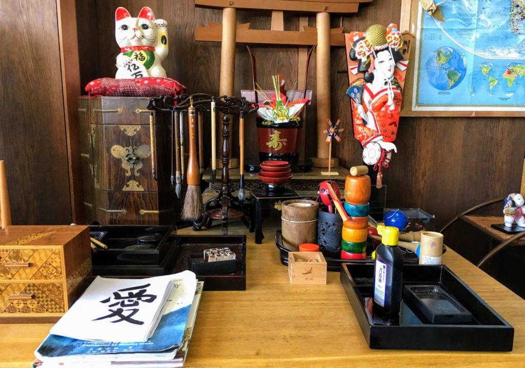 Miyajima Guest House Mikuniya, miyajima deer, best budget accommodation on miyajima hiroshima, japanese garden, white tanuki, ryokan guesthouse and hostel, Japanese culture and handicrafts station