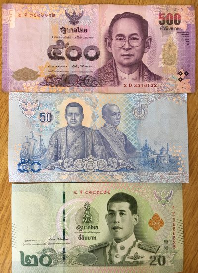 Thai Baht bills with old king and new king, budget for thailand travel